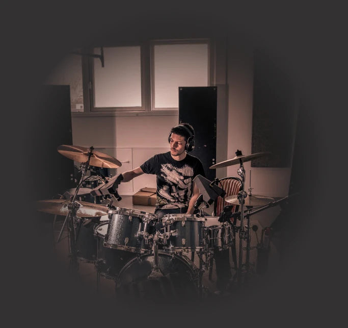 Simon on a drum set